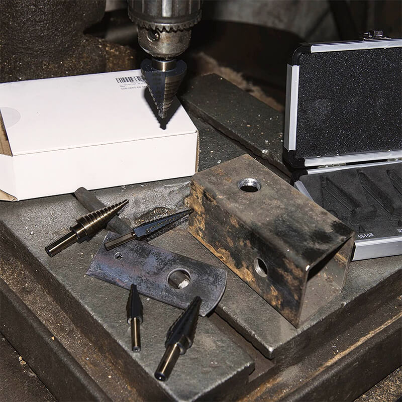 Step drill bit set UniDrill