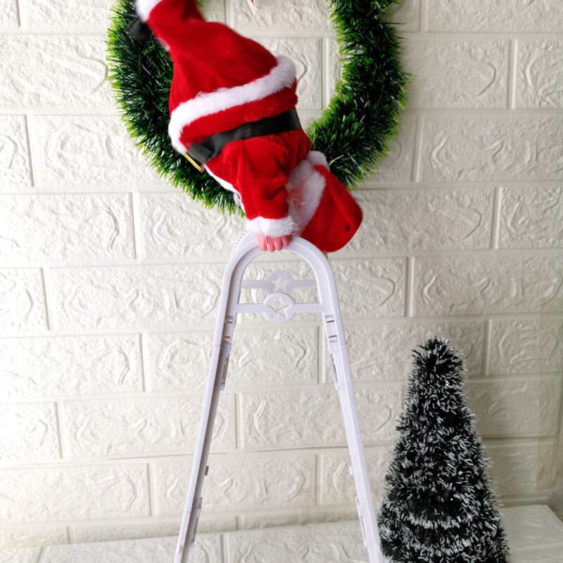 Djed Božićnjak koji se penje po ljestvama Mr. Kringle