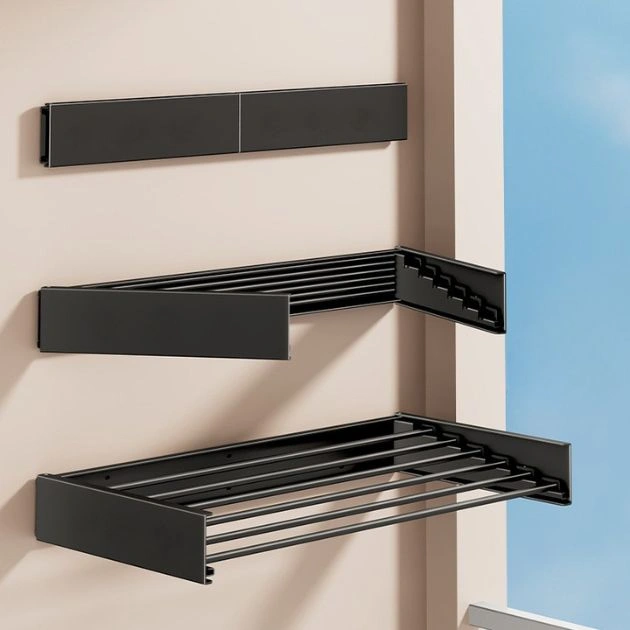 Montowany na ścianie składany wieszak do suszenia ubrań DryPRO™